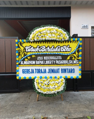 Papan Bunga Duka di Langkapura